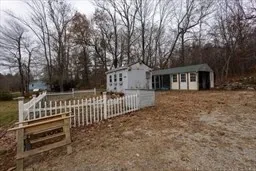 a view of a large building with a yard