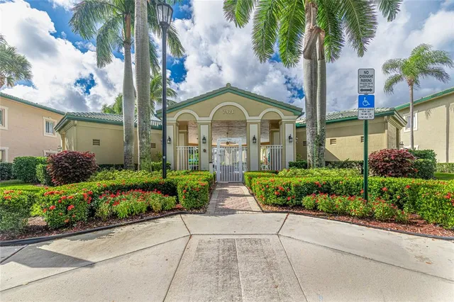 a view of a swimming pool with a lounge chairs