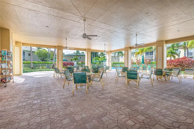 a bunch of flowers are in a window