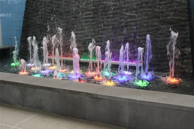 a view of a swimming pool with chairs