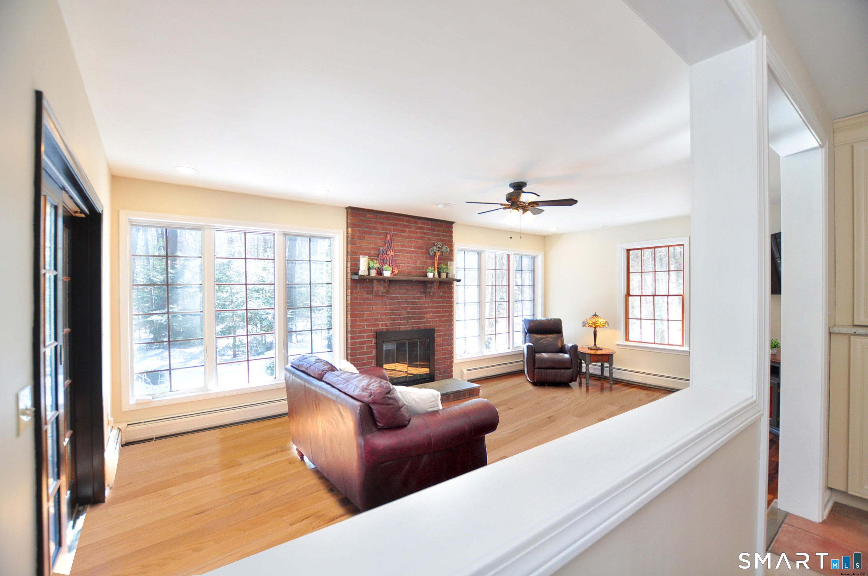 102 Petersen Road Granby, CT 06035 - Photo 15 of 40 a living room with furniture and a fireplace