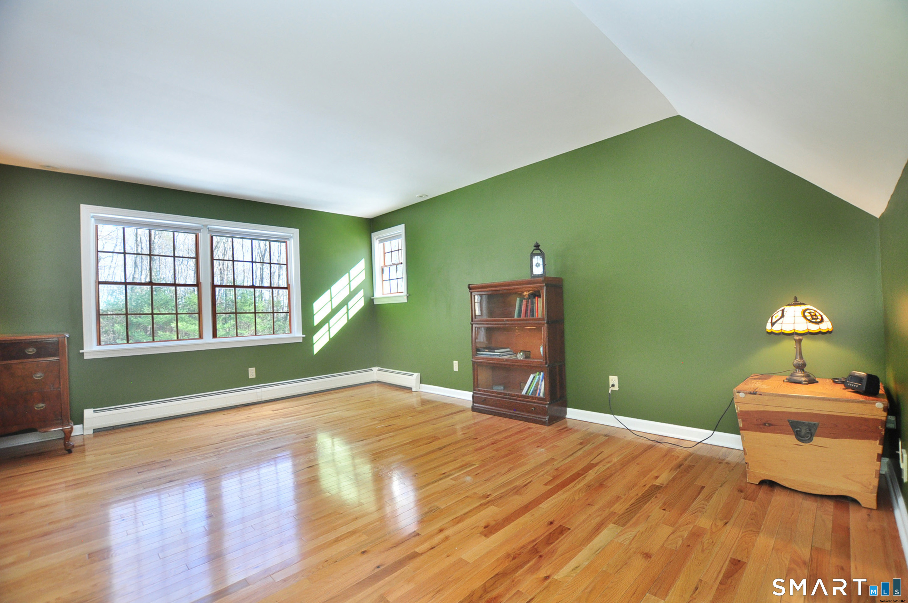 102 Petersen Road Granby, CT 06035 - Photo 26 of 40 a bedroom with a bed and a window