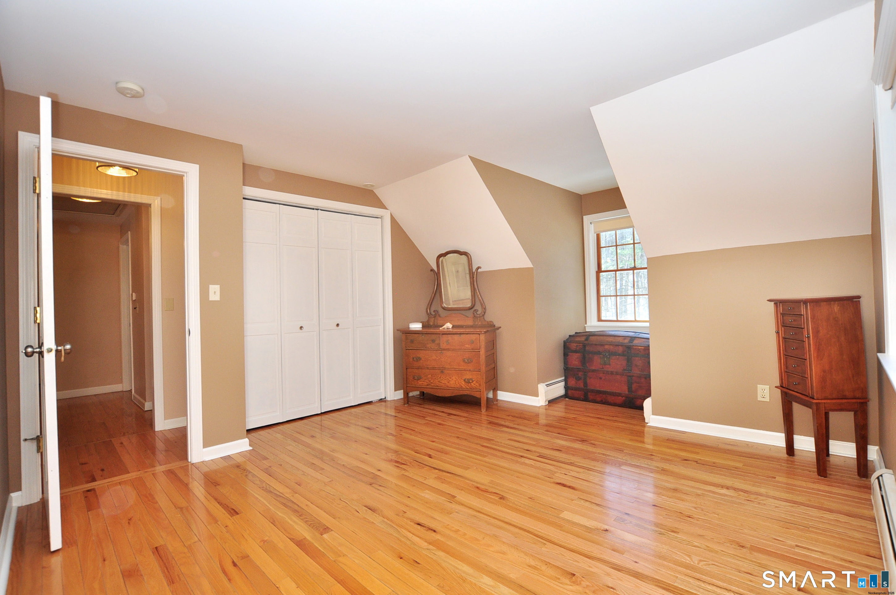 102 Petersen Road Granby, CT 06035 - Photo 29 of 40 a living room with furniture and a wooden floor