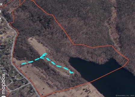 a view of lake and mountain