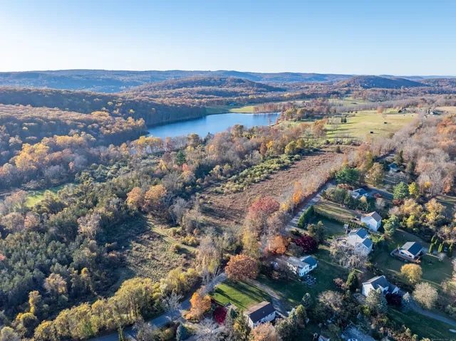 a view of mountains and city