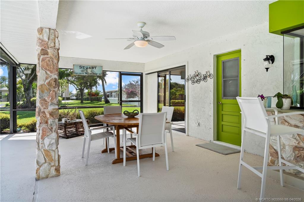 4620 Southeast Quail Trail Stuart, FL 34997 - Photo 45 of 71 a view of a dining room with furniture window and outside view