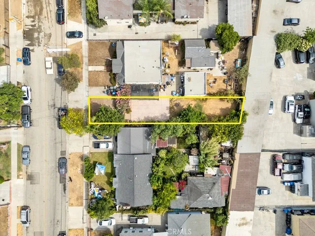 aerial view of multiple houses with outdoor space