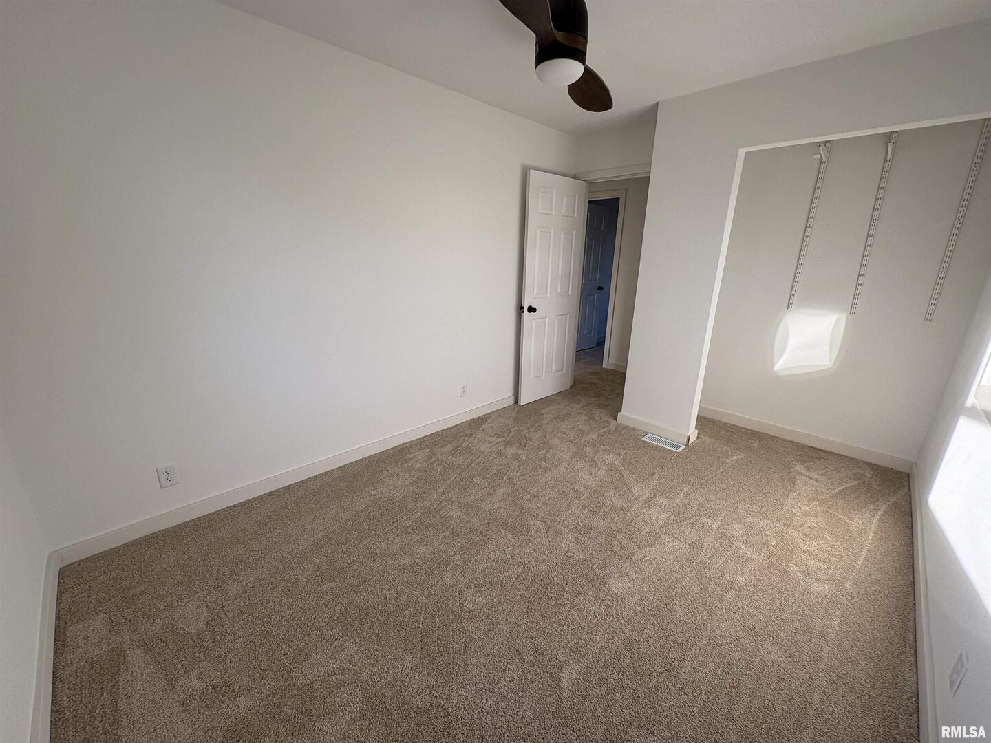 3305 Selmaville Road Salem, IL 62881 - Photo 13 of 17 an empty room with windows and closet