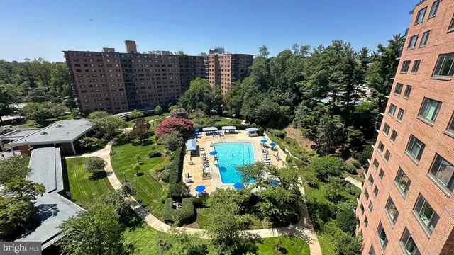 a picture of houses with city view