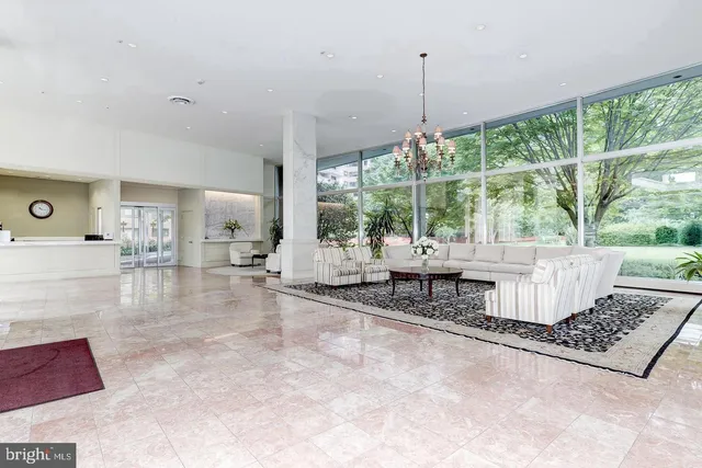 a living room with couch and a table