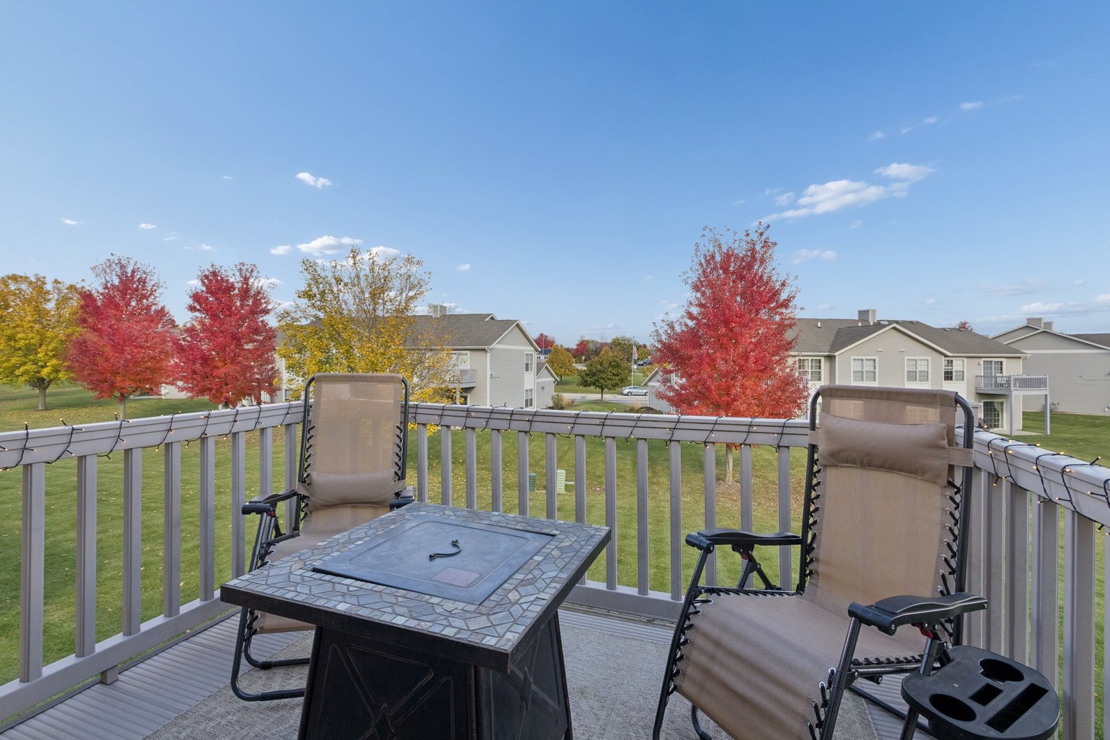 145 Penny Lane, Unit 1 Sycamore, IL 60178 - Photo 16 of 30 a view of a terrace with furniture and a potted plant
