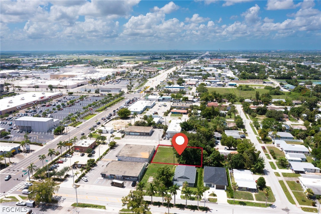 1925 Suwanee Avenue Fort Myers, FL 33901 - Photo 13 of 26 an aerial view of residential houses with outdoor space