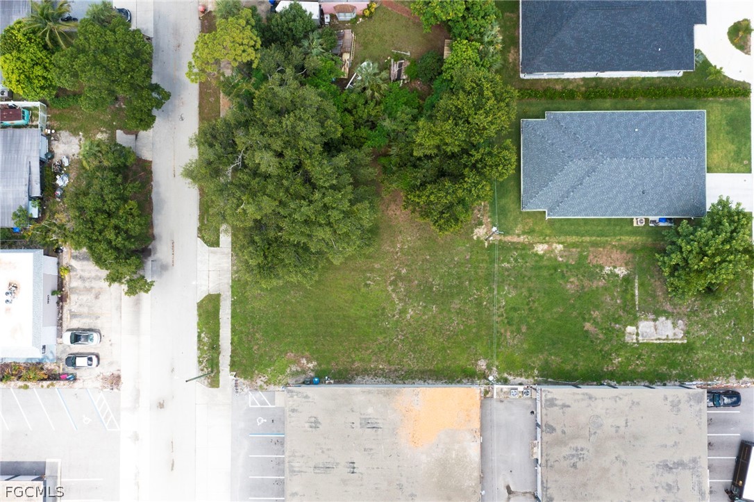 1925 Suwanee Avenue Fort Myers, FL 33901 - Photo 8 of 26 an aerial view of a house with a yard