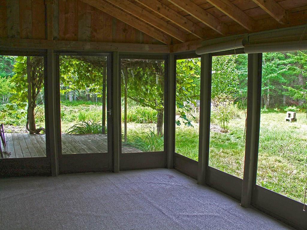 909 Oak Point Road Trenton, ME 04605 - Photo 12 of 30 Sun porch off the living room and...