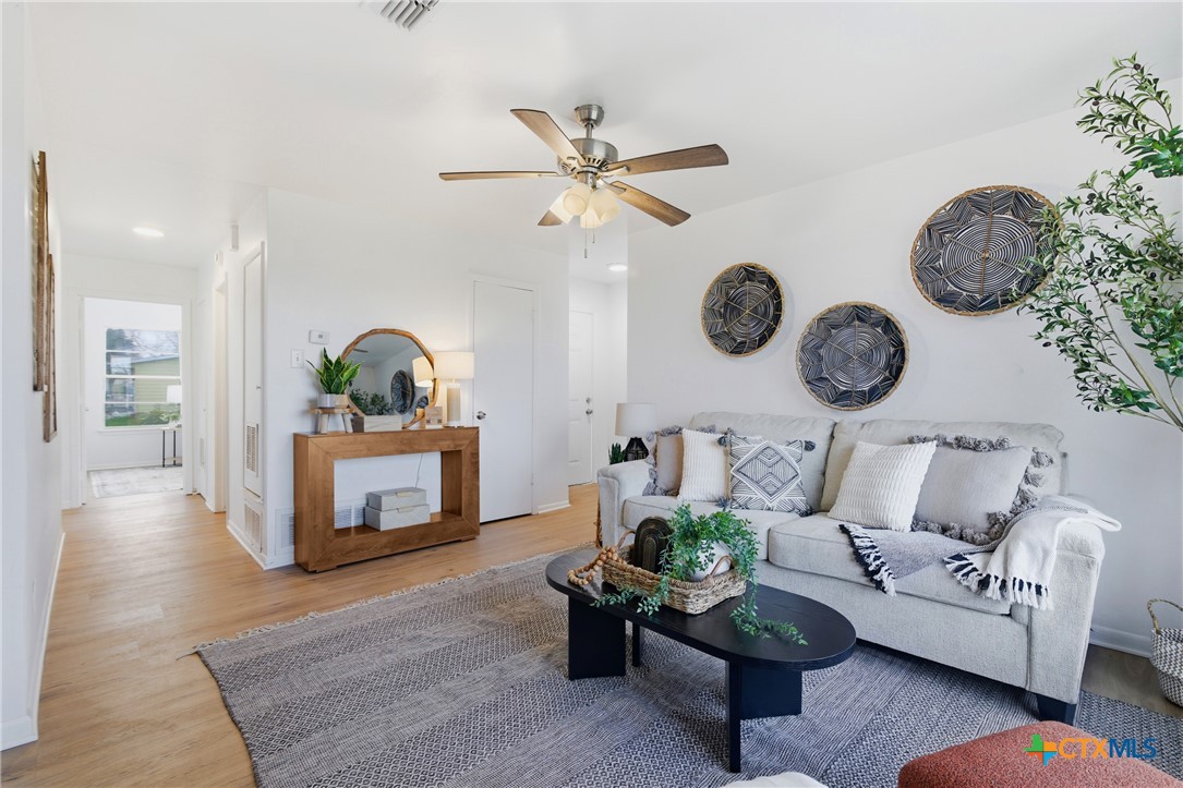 958 Fannin Loop Temple, TX 76501 - Photo 11 of 30 a living room with fireplace furniture and decor