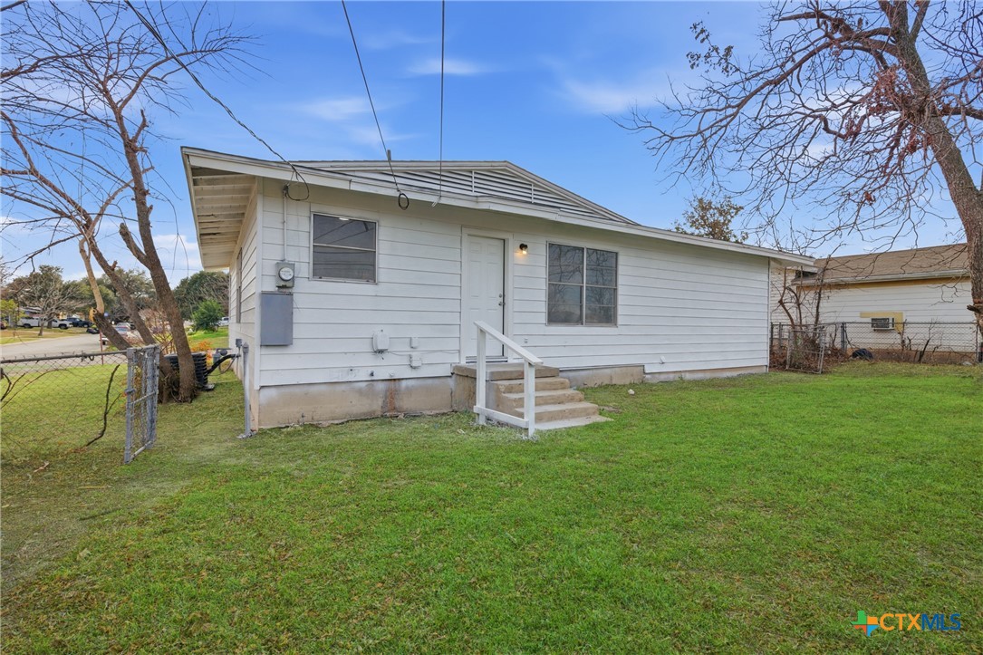 958 Fannin Loop Temple, TX 76501 - Photo 20 of 30 a view of a house with a backyard