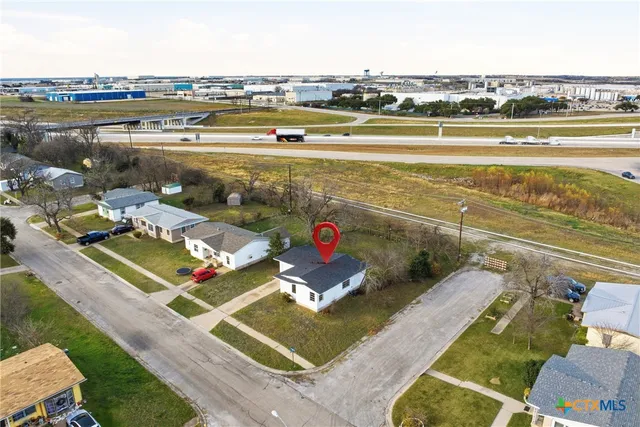 a house view with a garden space