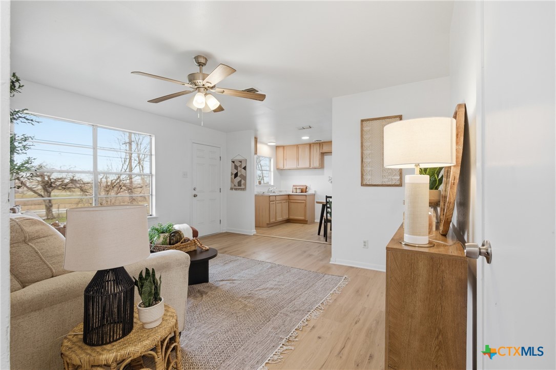 958 Fannin Loop Temple, TX 76501 - Photo 7 of 30 a living room with furniture a window and wooden floor