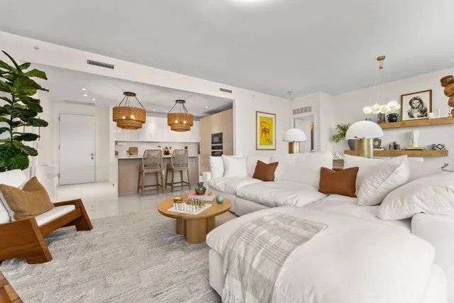 a balcony with furniture and city view