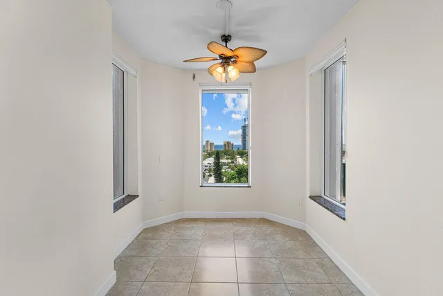 a view of an empty room and window