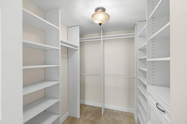 a view of an empty walk in closet