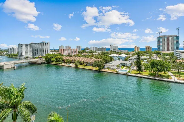 a view of a lake with a city