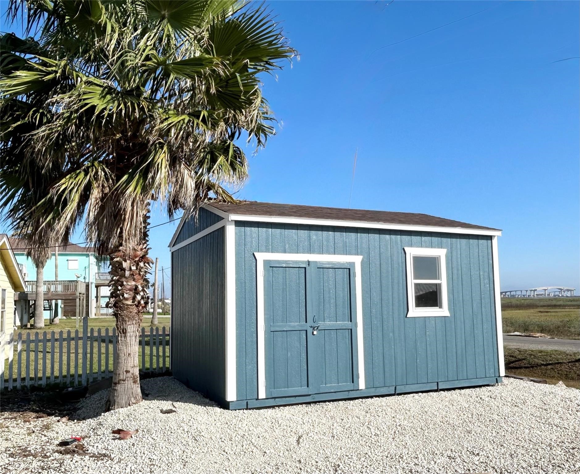 151 Neptune Bay City, TX 77414 - Photo 12 of 26 a house view with a backyard space
