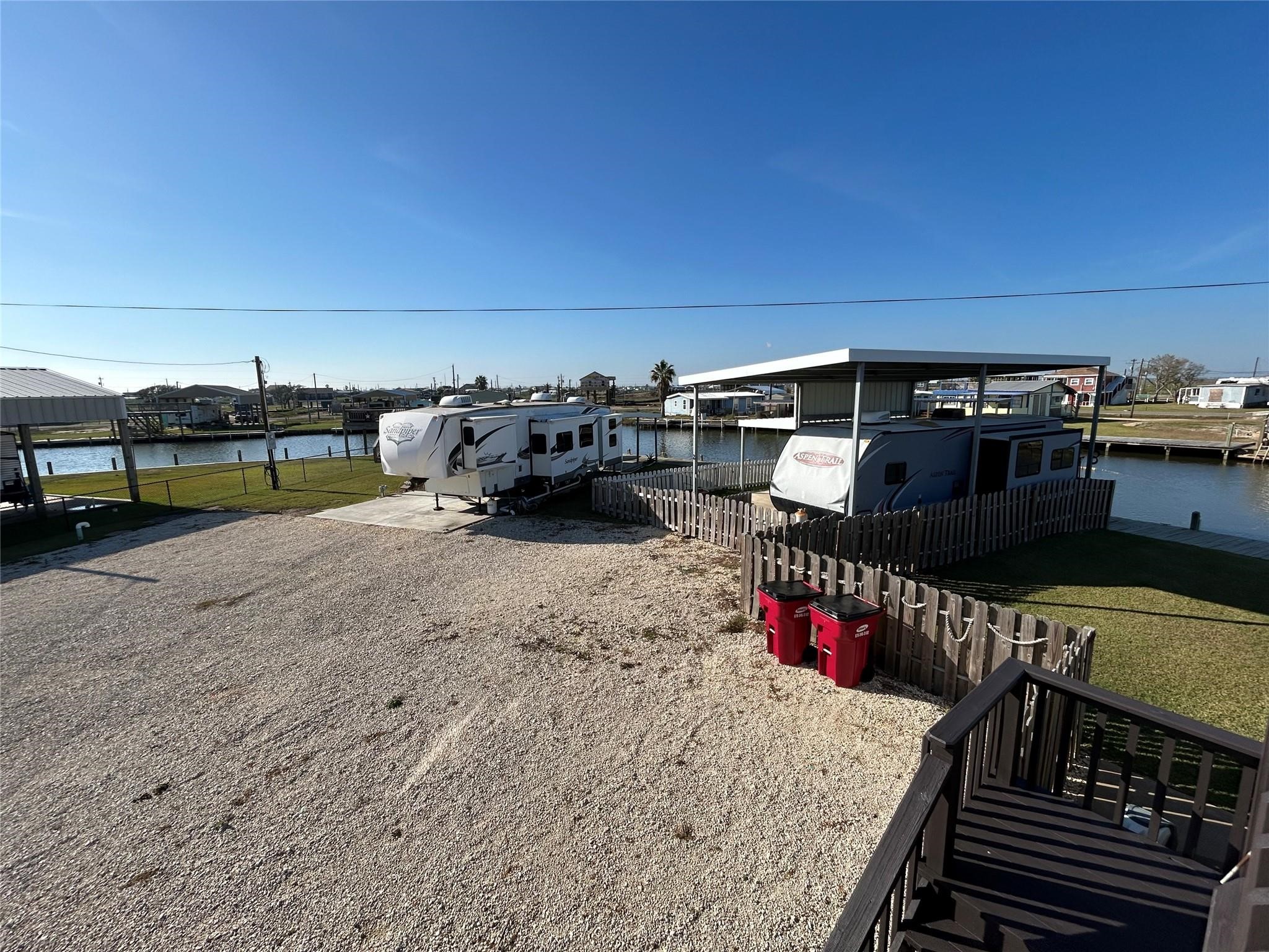 151 Neptune Bay City, TX 77414 - Photo 26 of 26 a view of car parked on the road