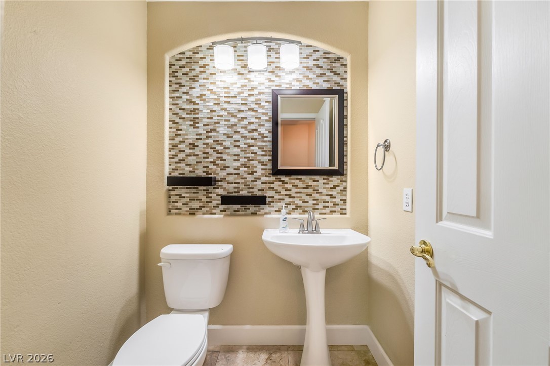 271 Pointe Ranier Avenue Henderson, NV 89012 - Photo 18 of 26 This thoughtfully designed bathroom offers a functional layout and contemporary finishes.