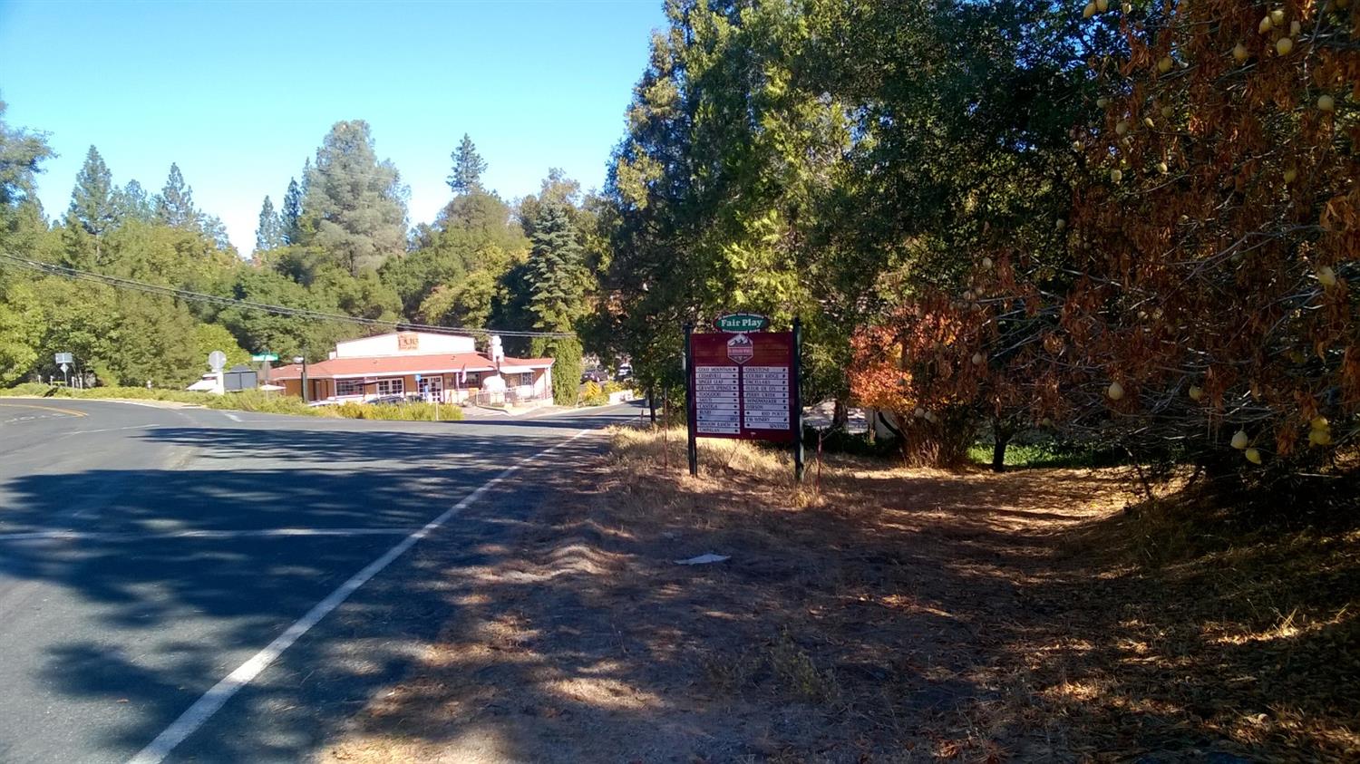 7935 Fairplay Road Somerset, CA 95684 - Photo 6 of 20 a sign that is sitting in the middle of a yard