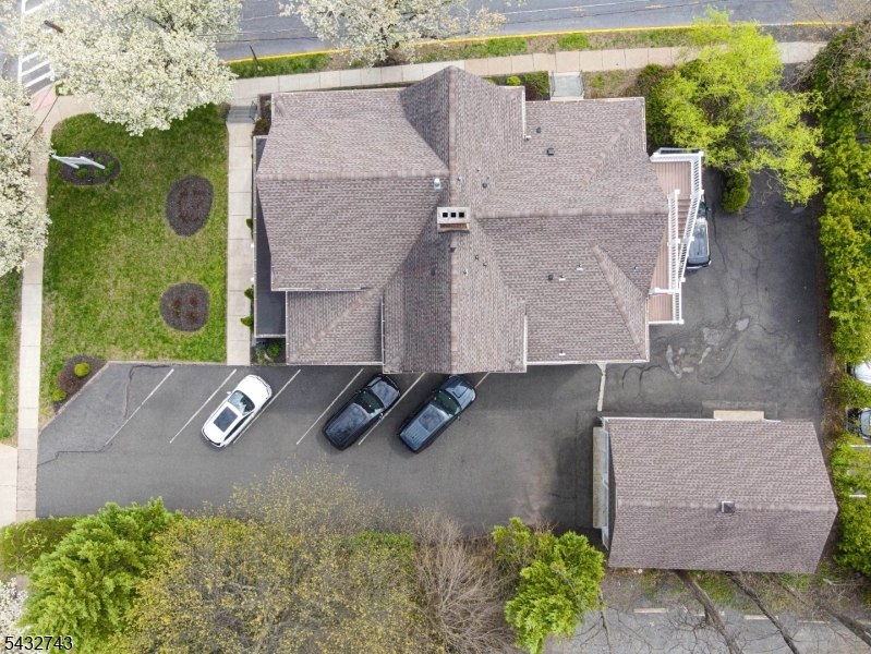 55 Main Street Chatham, NJ 07928 - Photo 13 of 14 an aerial view of a house with yard