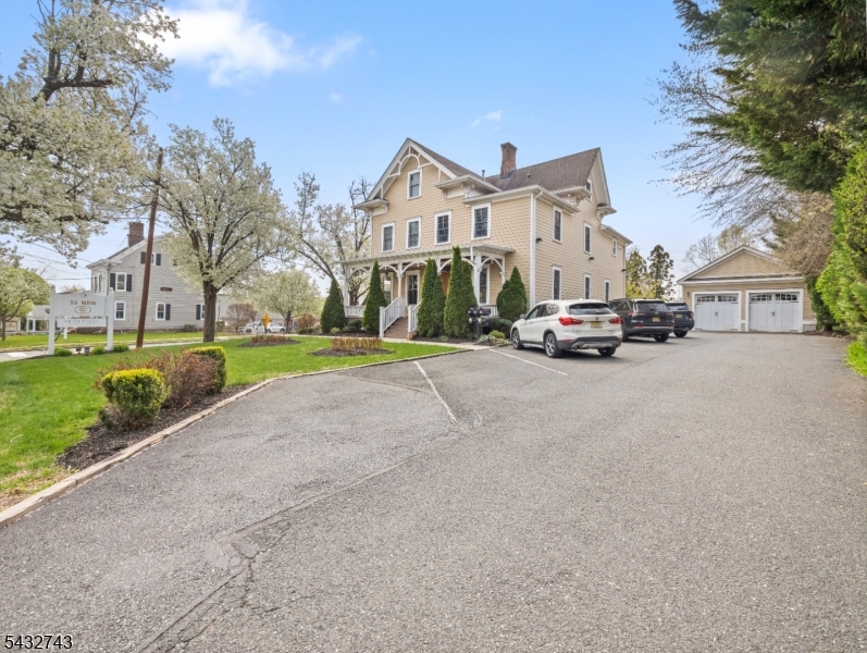 55 Main Street Chatham, NJ 07928 - Photo 14 of 14 a view of street with parked cars