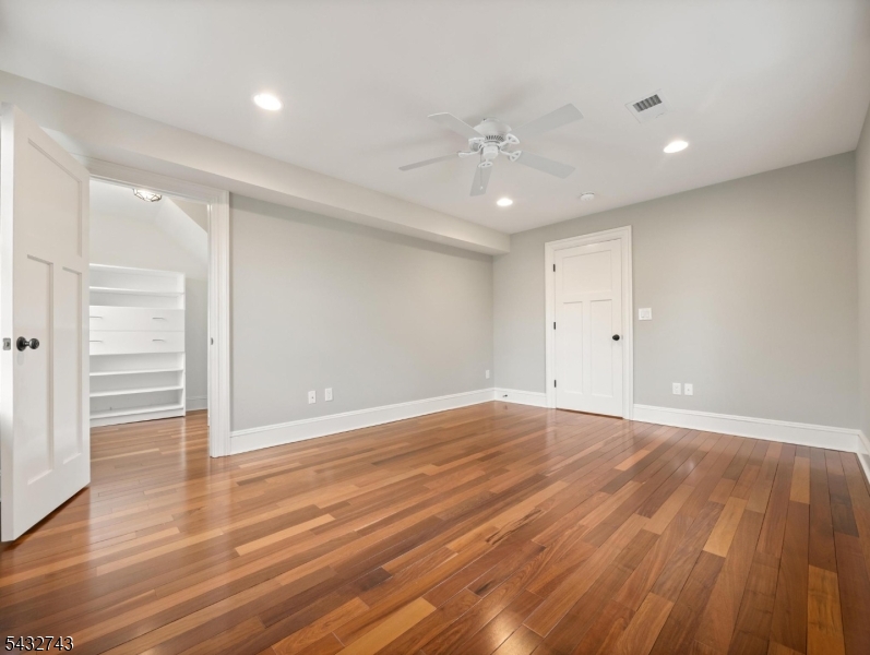55 Main Street Chatham, NJ 07928 - Photo 7 of 14 wooden floor in an empty room with wooden floor