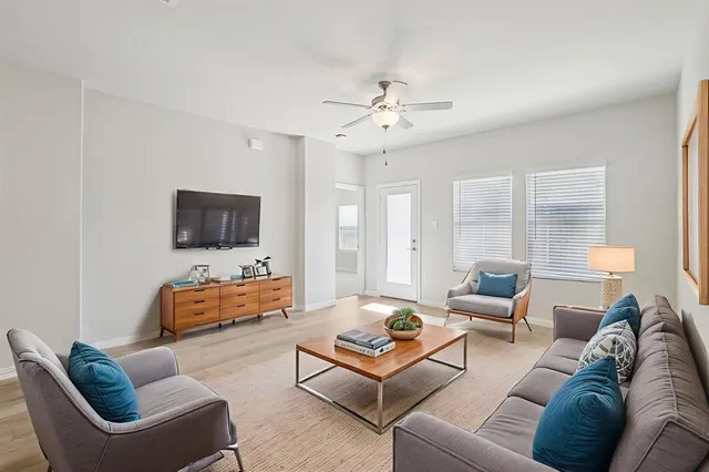 a view of an empty room with a window