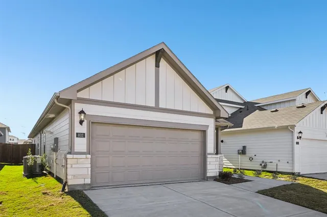 a view of a house with a garage