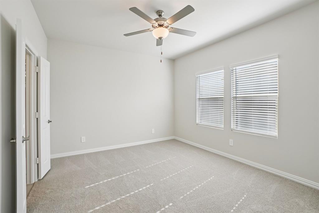 832 Sunflower Road Lavon, TX 75166 - Photo 21 of 39 a view of an empty room with a window