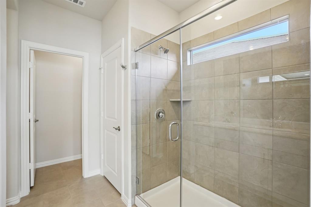832 Sunflower Road Lavon, TX 75166 - Photo 24 of 39 a bathroom with a shower