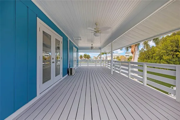 a view of balcony and wooden floor