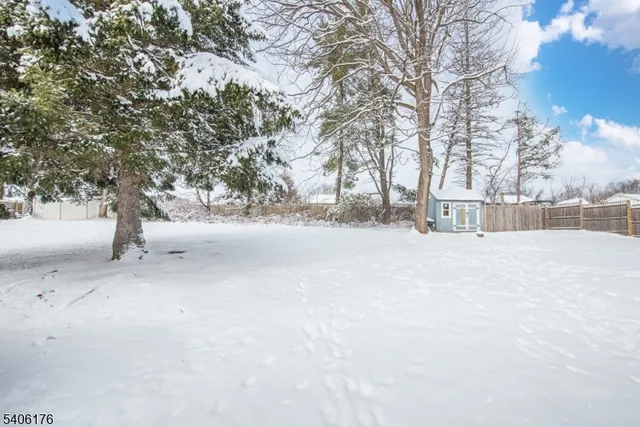 a view of snow on the side of the road