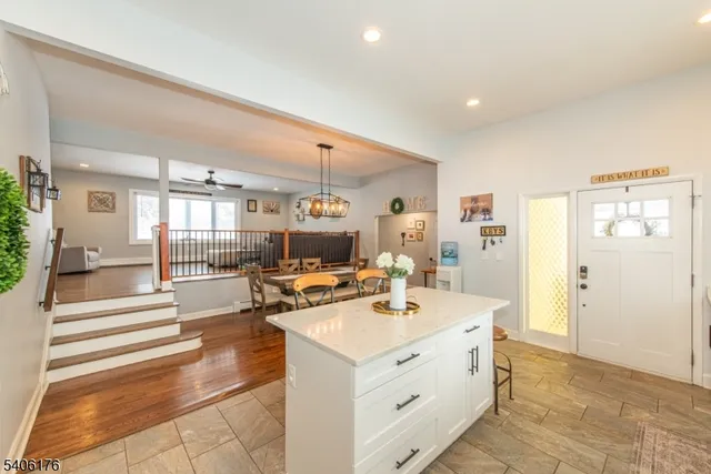a view of living room with furniture and flat screen tv