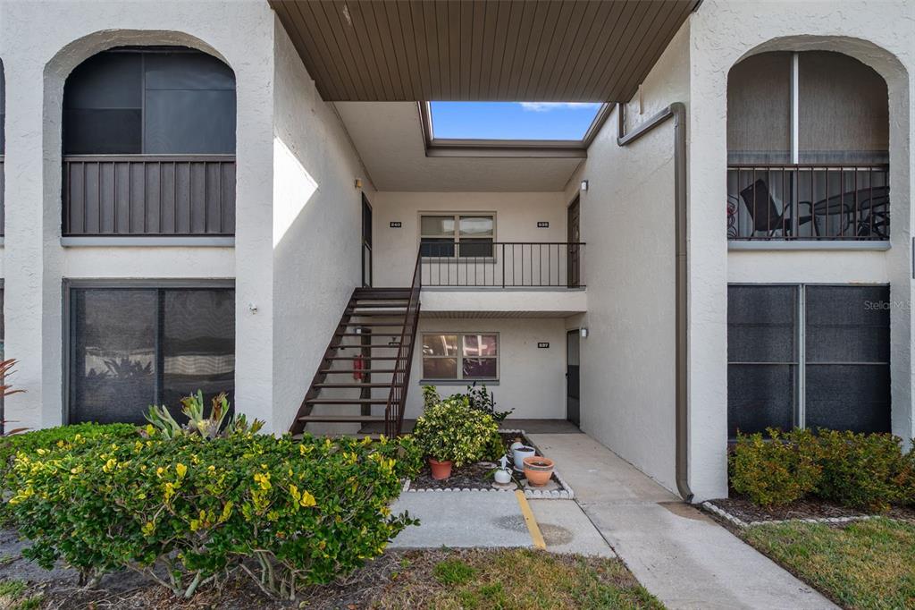 7701 Starkey Road, Unit 237 Seminole, FL 33777 - Photo 2 of 32 front view of a house with a porch