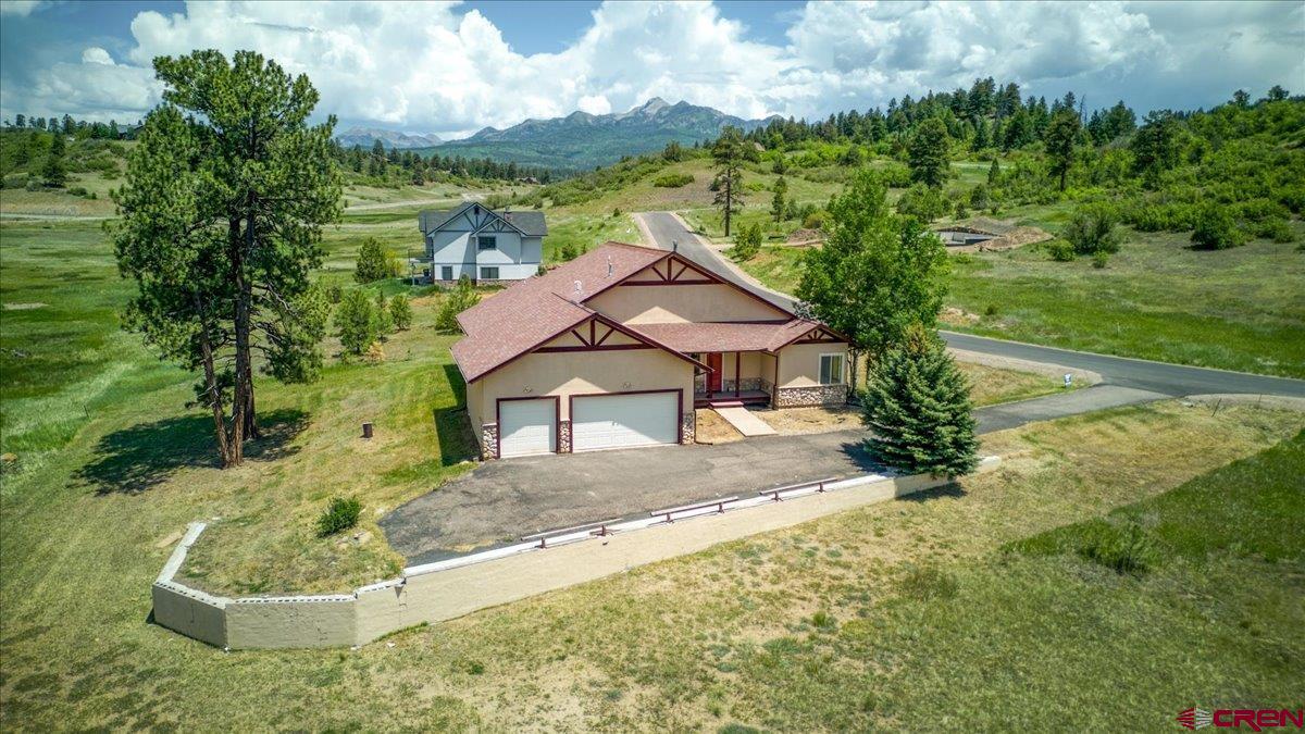 196 Dylan Drive Pagosa Springs, CO 81147 - Photo 40 of 44 a view of a house with a yard