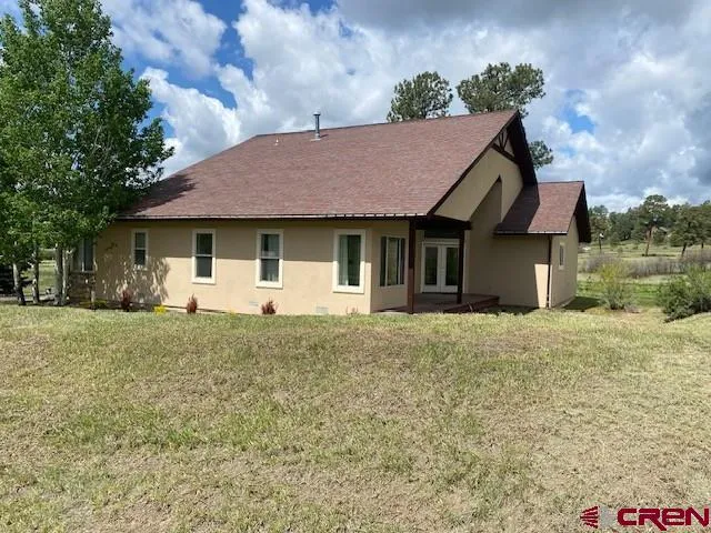 a view of a garden with an outdoor space