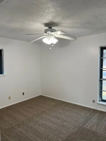 a view of a window in an empty room