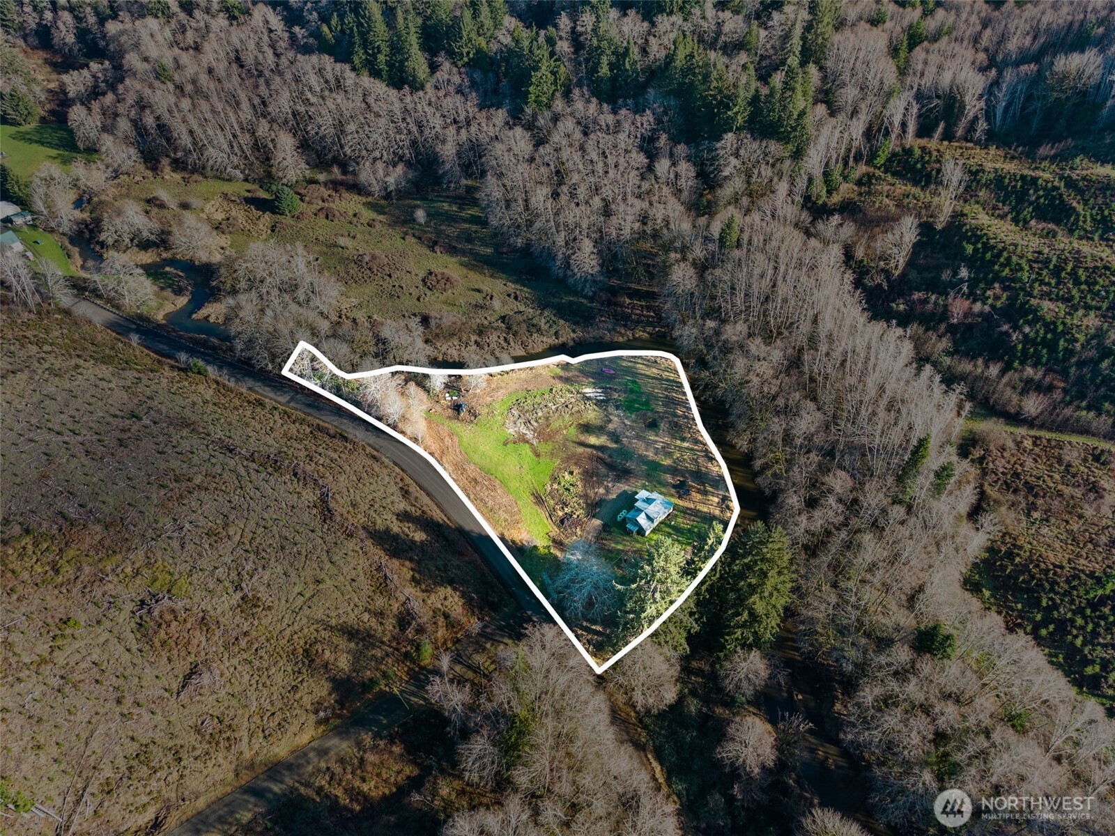 138 Ward Creek Road Raymond, WA 98577 - Photo 20 of 21 an aerial view of a house with a yard