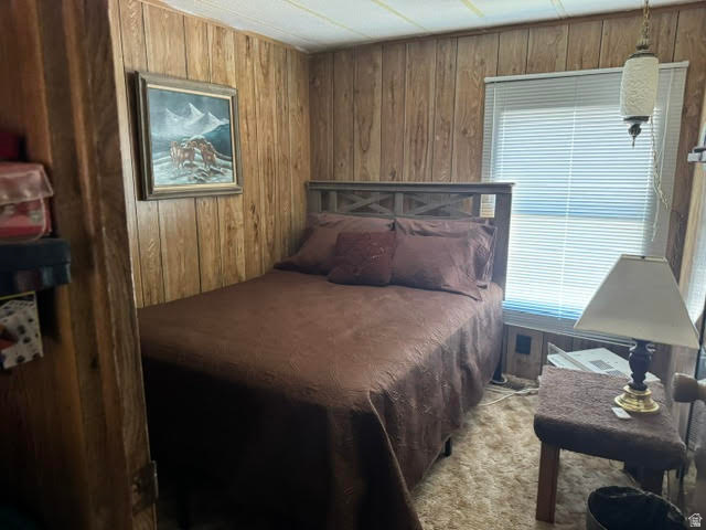 123 North 3rd Manila, UT 84046 - Photo 13 of 15 Wood-paneled room with a window featuring horizontal blinds and a built-in light fixture
