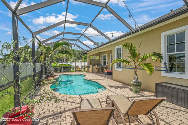 a view of yard with patio