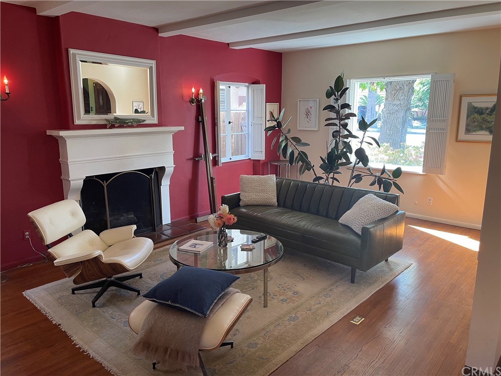 320 Park Avenue Long Beach, CA 90814 - Photo 2 of 8 a living room with furniture and a fireplace
