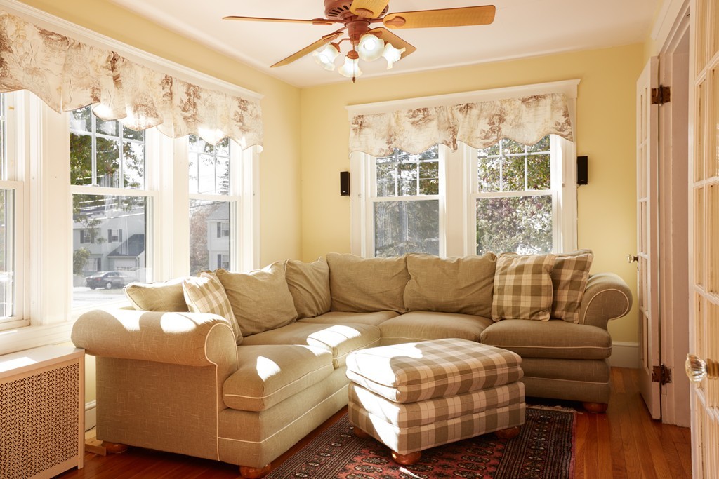 112 Bacon Street Natick, MA 01760 - Photo 6 of 20 a living room with furniture and a large window