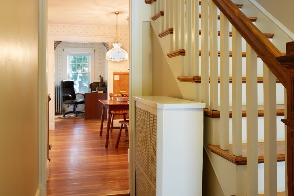 112 Bacon Street Natick, MA 01760 - Photo 8 of 20 a view of living room with furniture wooden floor and windows
